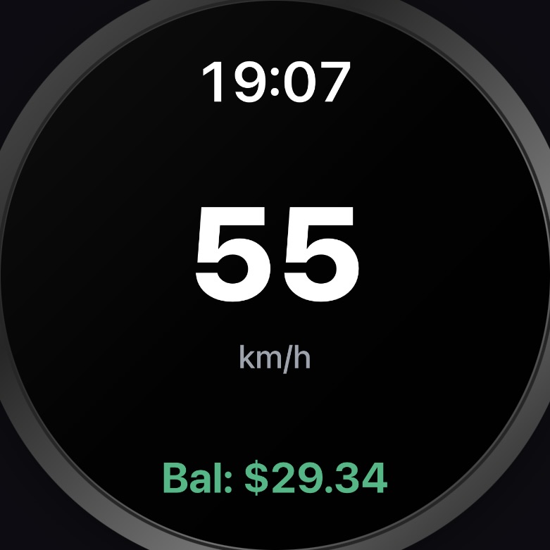 Round AMOLED display showing large speed and clock